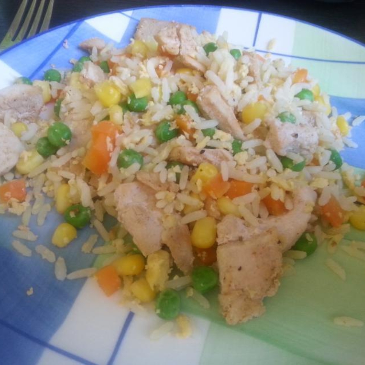 Gebratener Gemüsereis mit Poulet